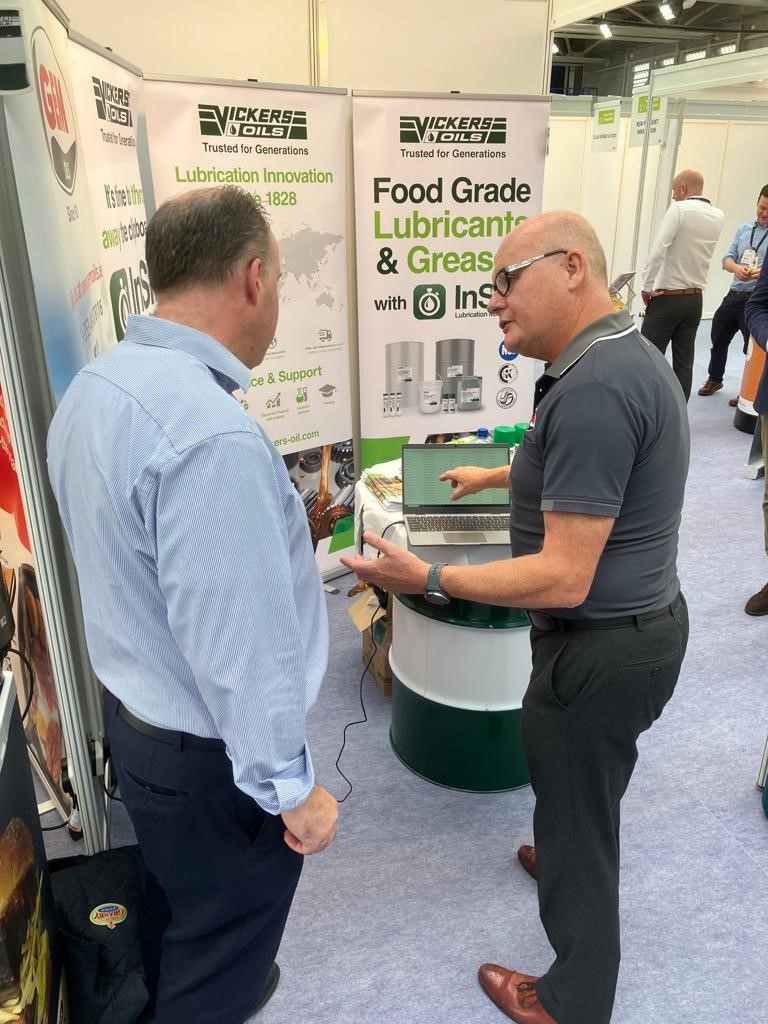 Vickers Oils Business Development Manager demonstrating the Insite Lubrication Management App at the Food, Retail and Hospitality Expo